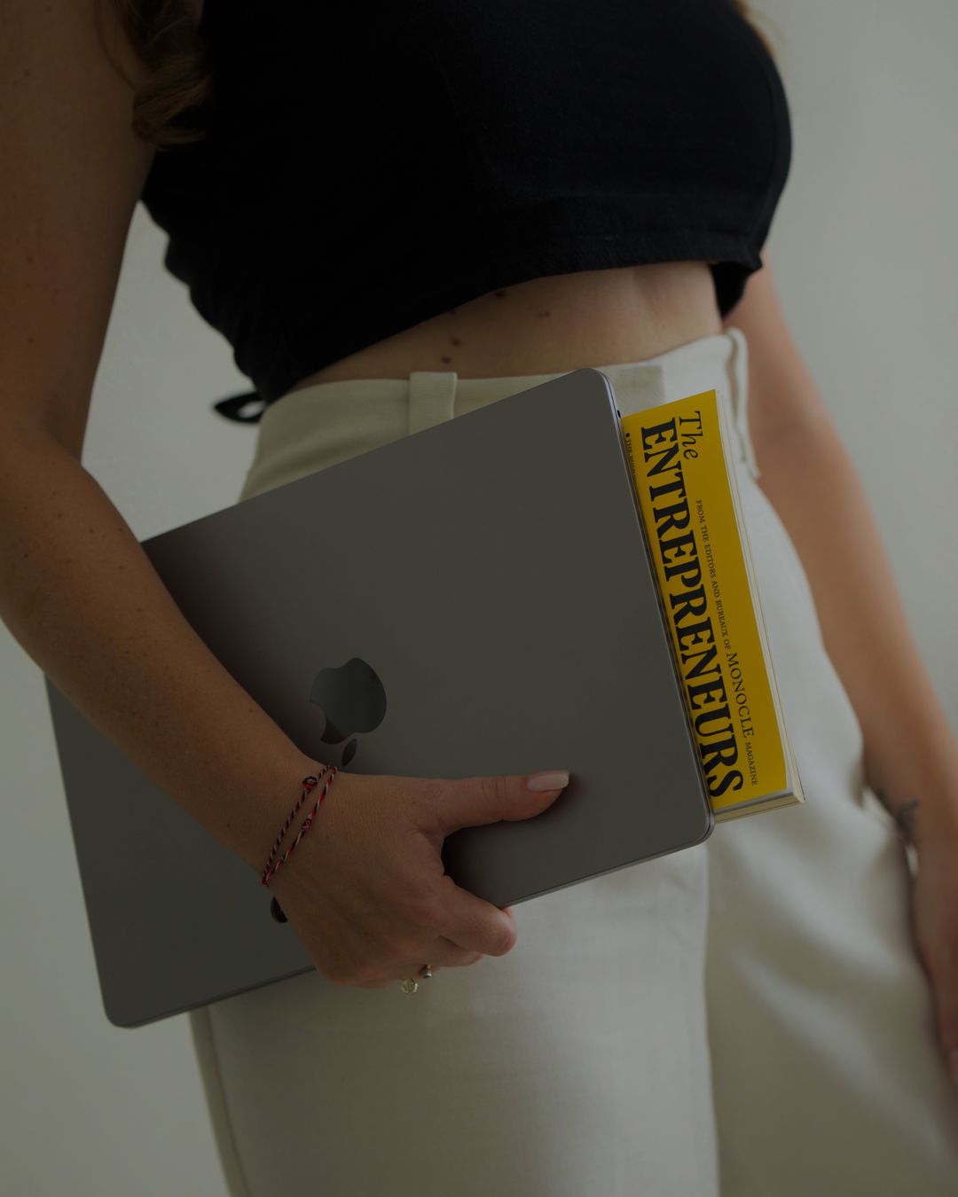 “The Entrepreneurs” magazine under an arm